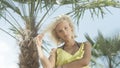 Portrait of beautiful caucasian girl posing on tropical beach. Royalty Free Stock Photo