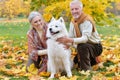 Beautiful caucasian senior couple with dog