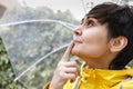 Portrait of beautiful caucasian woman with yellow raincoat Royalty Free Stock Photo