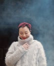 Chinese Asian Woman Wearing a sweater and a Scarft Royalty Free Stock Photo