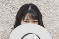 Portrait of a beautiful Chinese female cowgirl with a cowboy hat Royalty Free Stock Photo