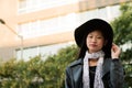 Portrait of a beautiful classy asian woman in hat Royalty Free Stock Photo