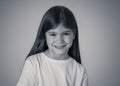 Portrait of a beautiful clever child with a happy, cheerful face looking confident. Human emotions Royalty Free Stock Photo