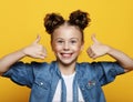 Portrait of a beautiful and confident girl showing thumbs up Royalty Free Stock Photo