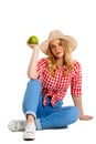 Portrait of beautiful country girl with apple over white background. Royalty Free Stock Photo