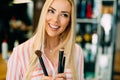 Portrait of the beautiful woman with make-up brushes Royalty Free Stock Photo