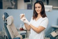 Young dentist woman in dental office