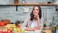 Portrait of beautiful dieting woman during breakfast at cosiness cuisine interior