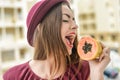 Portrait of beautiful elegant female papaya fruit next to her face Royalty Free Stock Photo