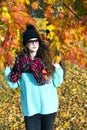 Portrait of a beautiful elegant woman in autumnal park Royalty Free Stock Photo