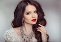 Portrait of a beautiful fashion bride girl with sensual red lips