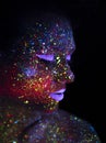 Portrait of Beautiful Fashion Woman in Neon UF Light. Model Girl with Fluorescent Creative Psychedelic MakeUp, Art Royalty Free Stock Photo