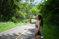 Portrait of beautiful fitness athlete woman drinking water after work out exercising. Royalty Free Stock Photo