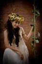 Portrait of beautiful girl in antique dress