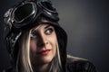 Portrait of a beautiful girl in aviator helmet