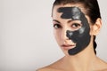 Portrait of beautiful girl with black mask clay