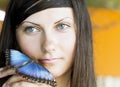 Portrait of beautiful girl with butterfly Royalty Free Stock Photo