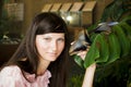 Portrait of beautiful girl with butterfly in a greenhouse Royalty Free Stock Photo