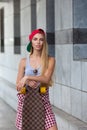 Portrait of beautiful girl in cap looking at camera Royalty Free Stock Photo