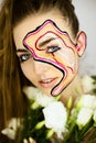 Portrait of beautiful girl with creative make up