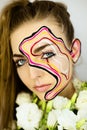 Portrait of beautiful girl with creative make up