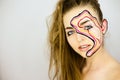 Portrait of beautiful girl with creative make up