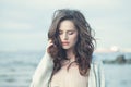 Portrait of a Beautiful Girl with Curly Hair on a Cold Windy Day Royalty Free Stock Photo