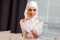 Portrait of a beautiful girl in eastern appearance in a white wedding dress Muslim Royalty Free Stock Photo