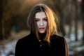 Portrait of a beautiful girl with flying hair in the wind. Young sad woman. Portrait of lonely woman Royalty Free Stock Photo