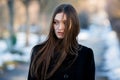 Portrait of a beautiful girl with flying hair in the wind. Young sad woman. Portrait of lonely woman Royalty Free Stock Photo