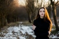 Portrait of a beautiful girl with flying hair in the wind. Young sad woman. Portrait of lonely woman Royalty Free Stock Photo