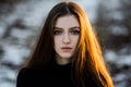 Portrait of a beautiful girl with flying hair in the wind. Young sad woman. Portrait of lonely woman Royalty Free Stock Photo