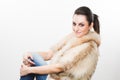 Portrait of beautiful girl in furs, rings