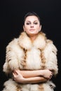 Portrait of beautiful girl in furs, rings