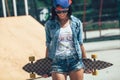 Portrait of beautiful girl in glasses and cap looking Royalty Free Stock Photo