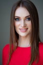 Portrait beautiful girl long hair in red close-up Royalty Free Stock Photo