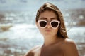 Portrait of a beautiful girl with long hair and sunglasses Royalty Free Stock Photo