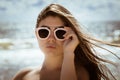 Portrait of a beautiful girl with long hair and sunglasses Royalty Free Stock Photo