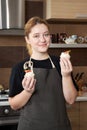 Portrait of a beautiful girl pastry chef