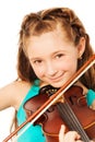 Portrait of beautiful girl playing on violin Royalty Free Stock Photo