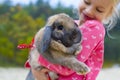 Portrait of beautiful girl with rabbit