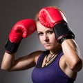 Portrait of beautiful girl with red boxing gloves Royalty Free Stock Photo
