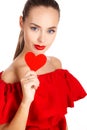 Portrait of beautiful girl with red heart