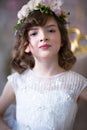 Elegant girl with a flower wreath on her head Royalty Free Stock Photo
