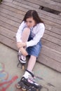 Portrait of beautiful girl with skates