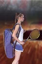 Portrait of beautiful girl tennis player with a racket on dark background Royalty Free Stock Photo