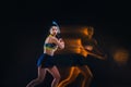 Portrait of beautiful girl tennis player with a racket on dark background Royalty Free Stock Photo