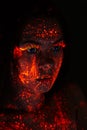 Portrait of beautiful girl with ultraviolet paint on her face. Girl with neon make-up in color light Royalty Free Stock Photo