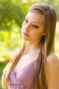 Portrait of beautiful girl walking in nature on spring day Royalty Free Stock Photo