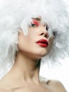 Portrait of Beautiful Girl in white feathers Royalty Free Stock Photo